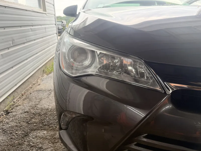 Grey Toyota Camry headlight after restoration