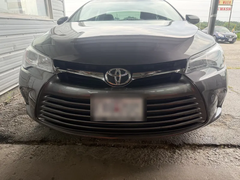 Grey Toyota Camry headlight after restoration