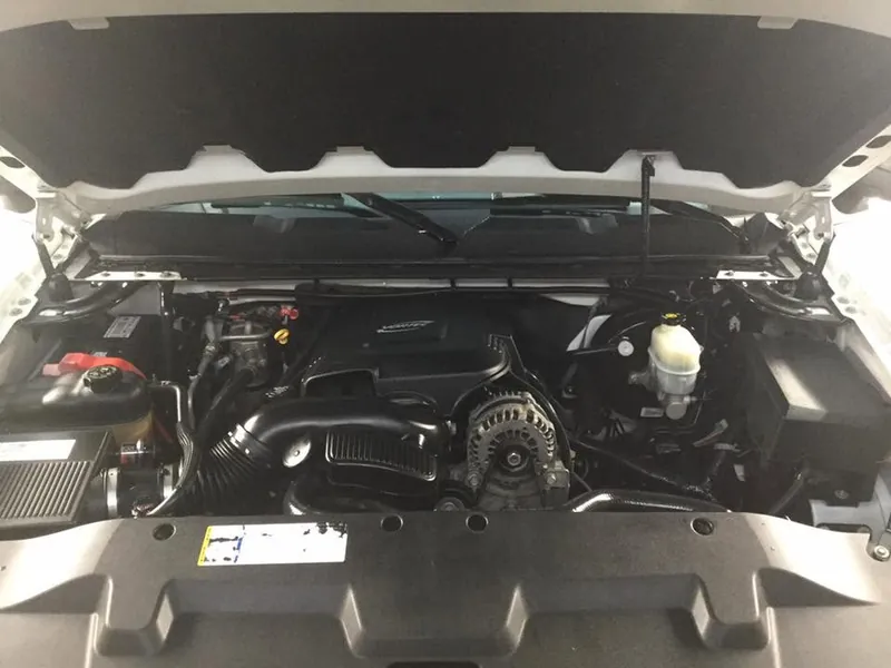 White pickup truck — engine bay detail
