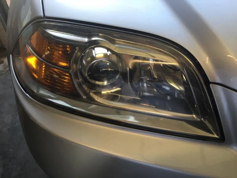 Gold car — headlight restoration — after