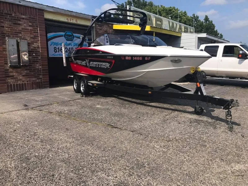 Black boat (on trailer) — exterior after detailing
