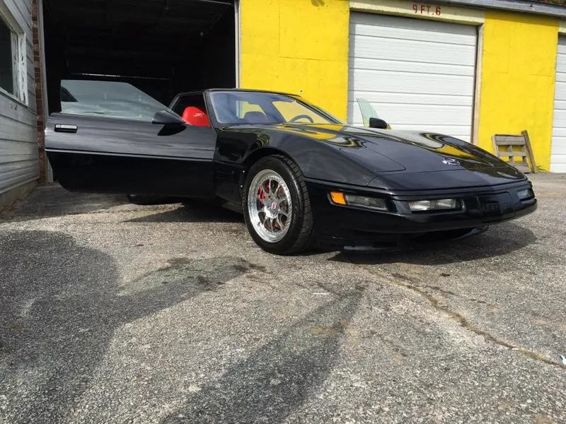 Black sports car — exterior after detailing
