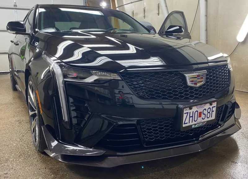 Black sedan — exterior after detailing