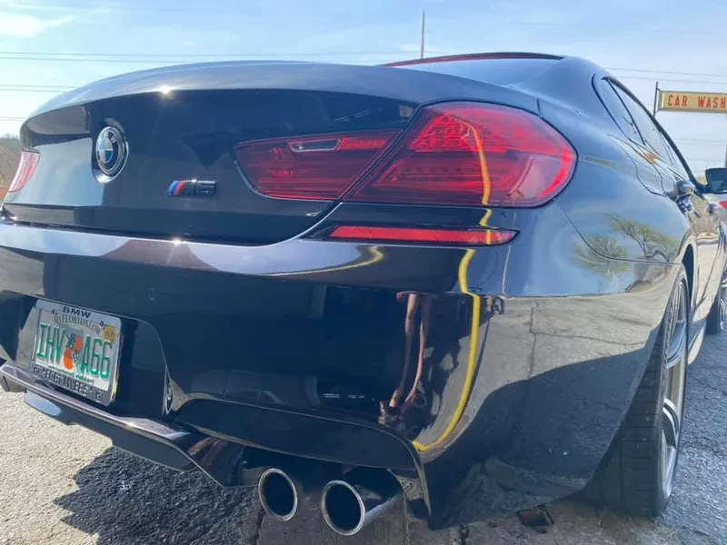 Black luxury car — exterior after detailing