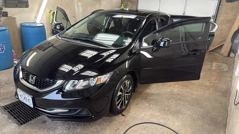Black sedan — exterior after detailing