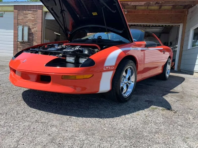 Orange sports car — exterior after detailing
