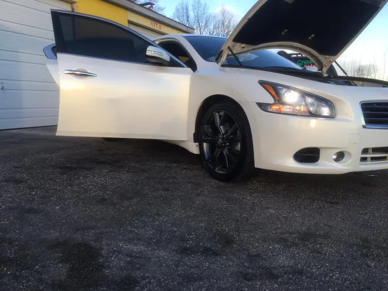 White sedan — exterior after detailing
