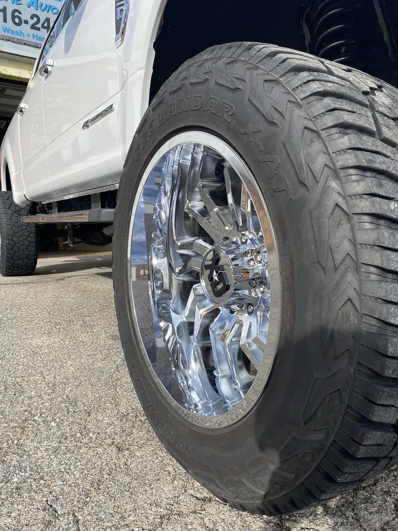 White pickup truck — wheel detail