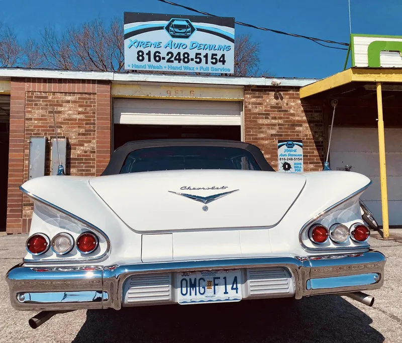 Restored white 1958 classic car, freshly detailed
