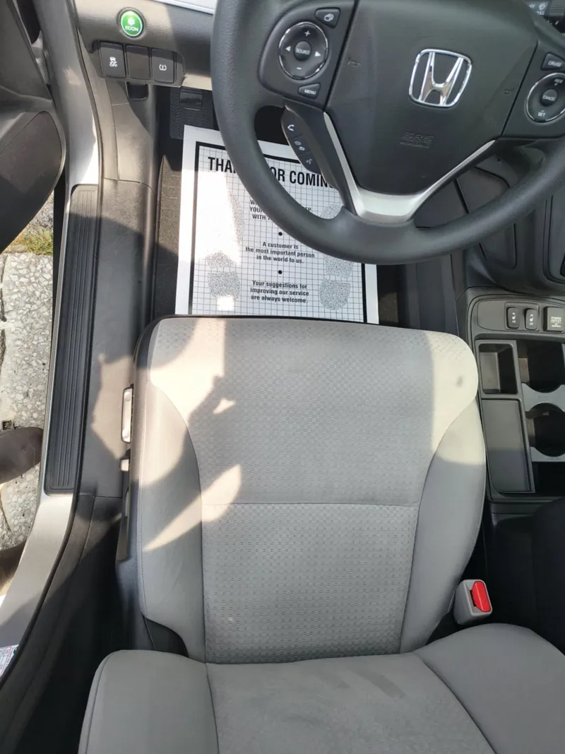Grey SUV interior — deep-clean detail (front seat)